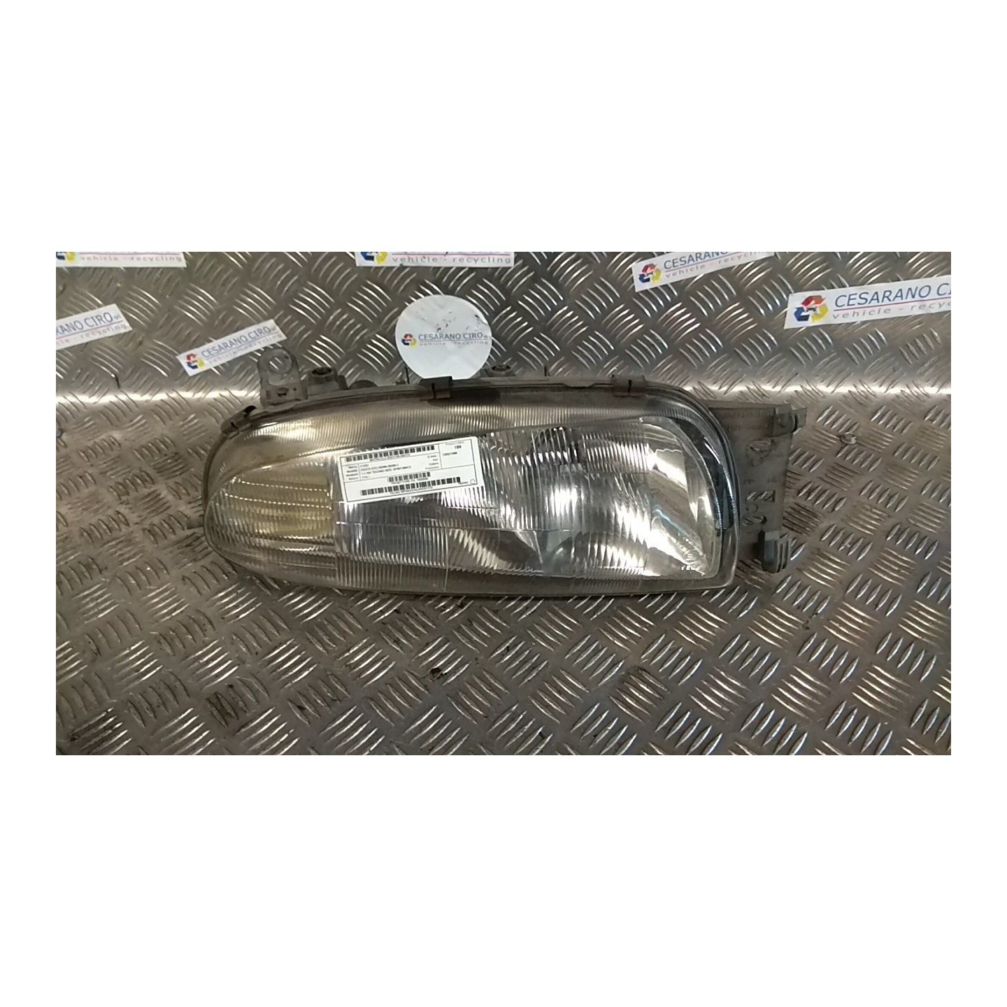 PROIETTORE DX. 131 FORD FIESTA (DX) (09/95-08/99) FHA 1042630