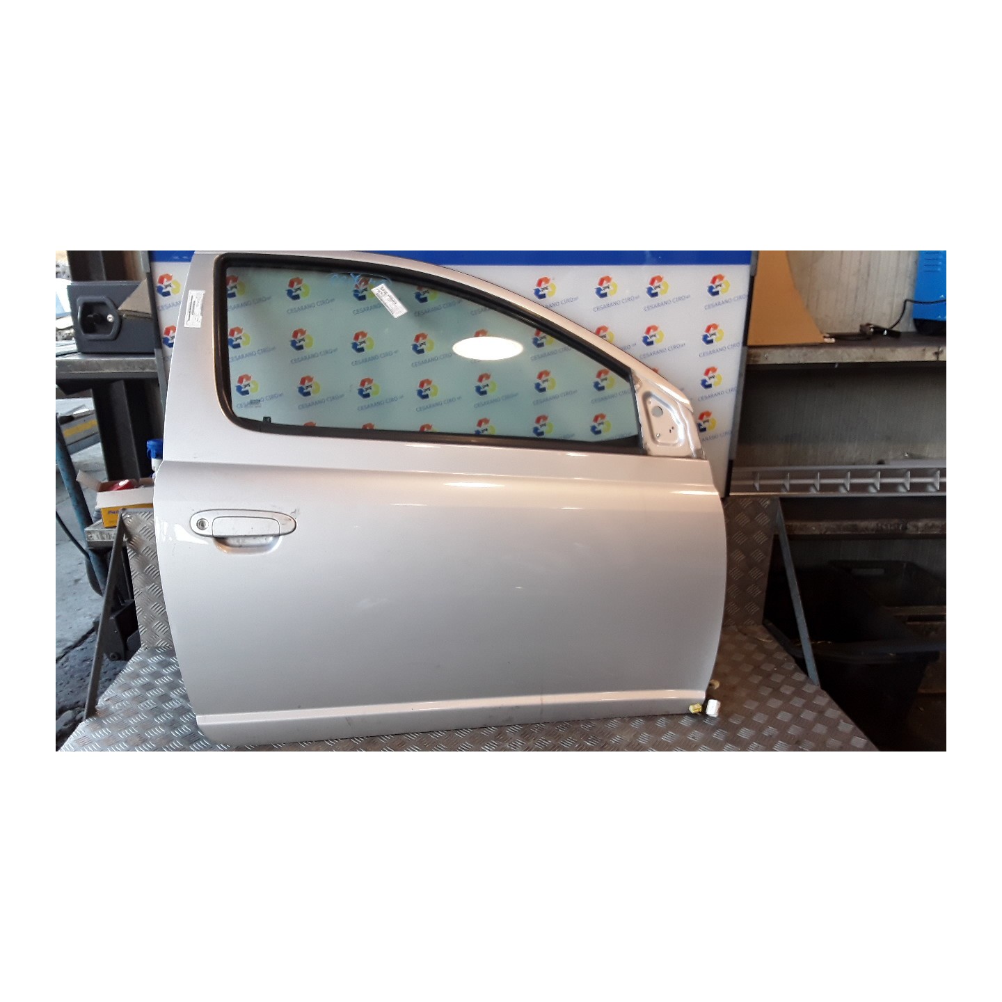 PORTA ANT. 02-03 DX. 186 TOYOTA YARIS (10/01-11/05)     (FRP) 1SZFE 670010D080