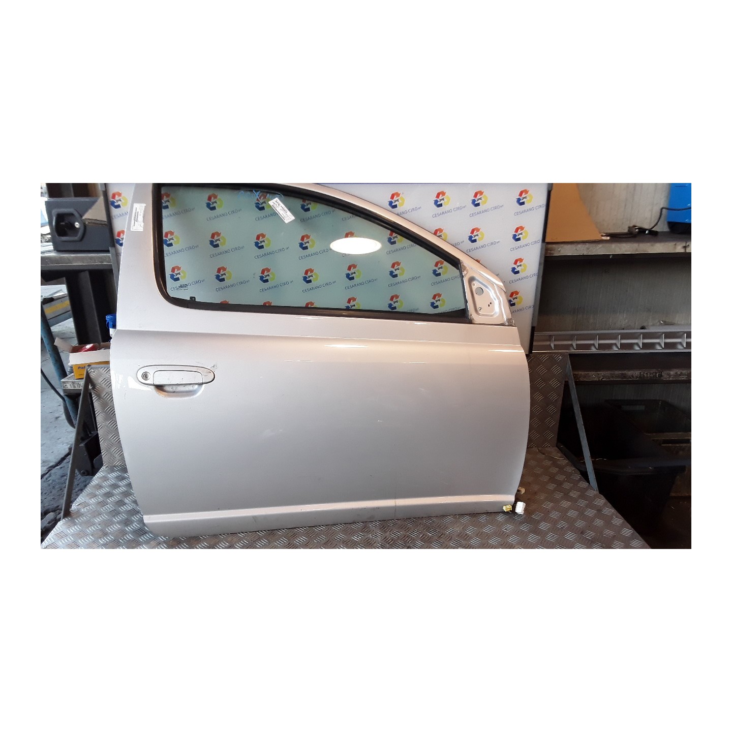 PORTA ANT. 02-03 DX. 186 TOYOTA YARIS (10/01-11/05)     (FRP) 1SZFE 670010D080