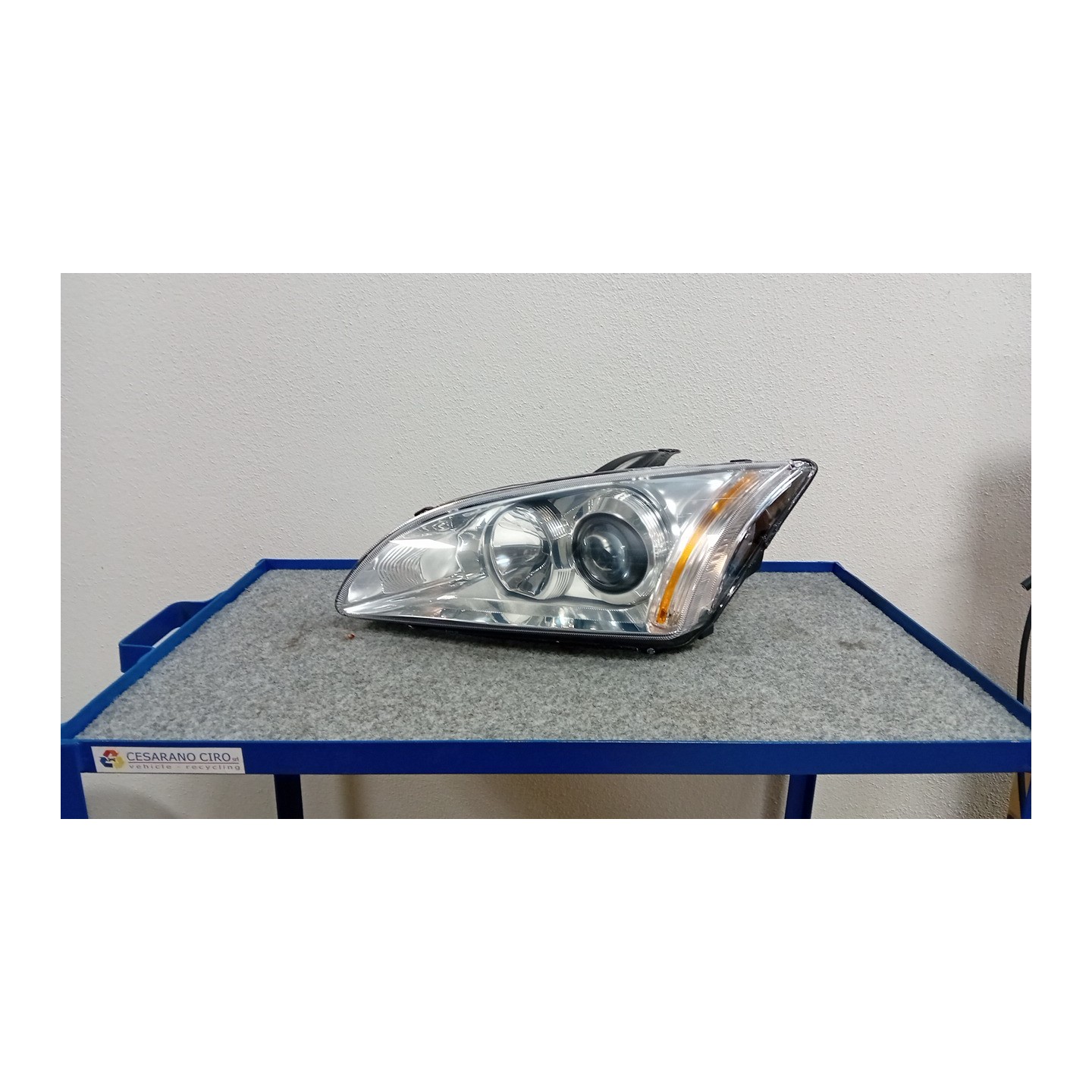 PROIETTORE SENZA CORNICE FINITURA NE SX. 163 FORD FOCUS (CAP) (11/04-06/08)  1480990
