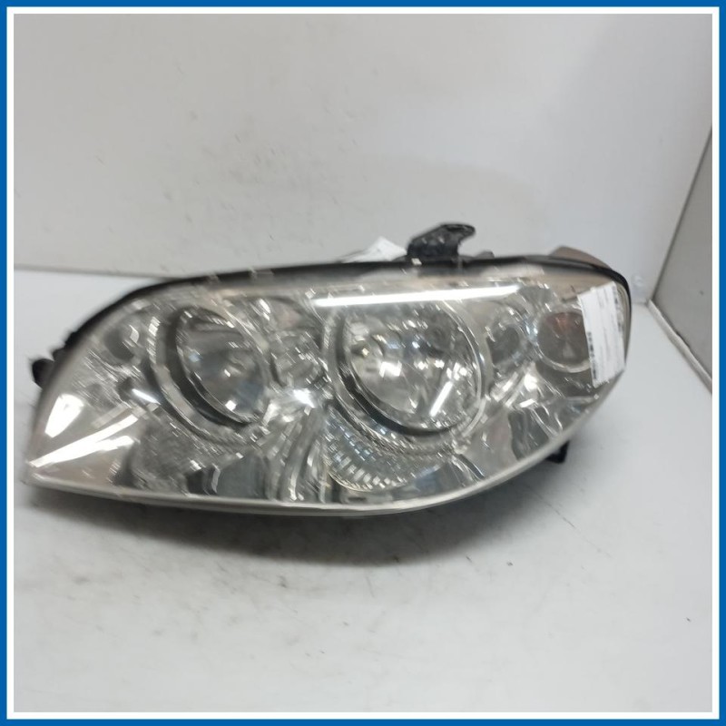 Proiettore ant. sx. FIAT PUNTO (2U) (07/03>01/07