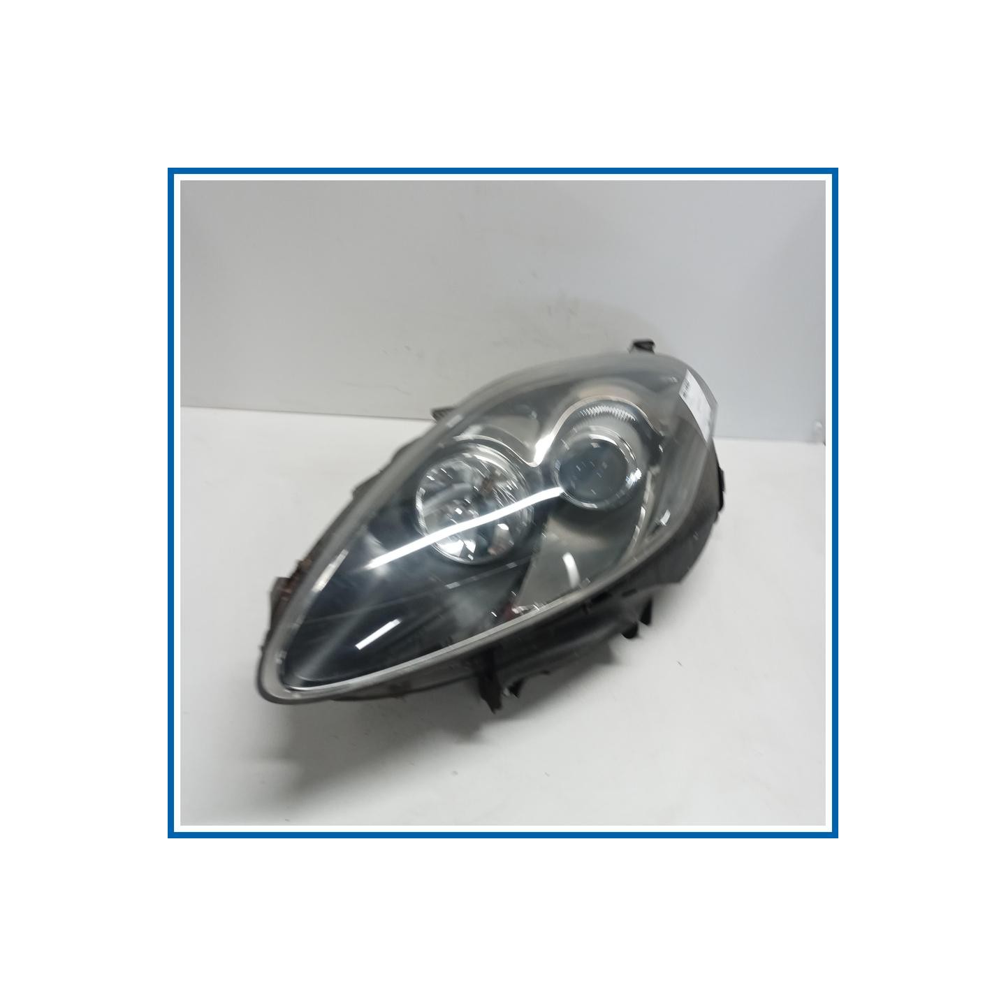 Proiettore ant. sx. FIAT Bravo II